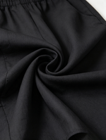 MARBELLA| MONO NEGRO CON HOMBROS AL AIRE Y CORDÓN AJUSTABLE