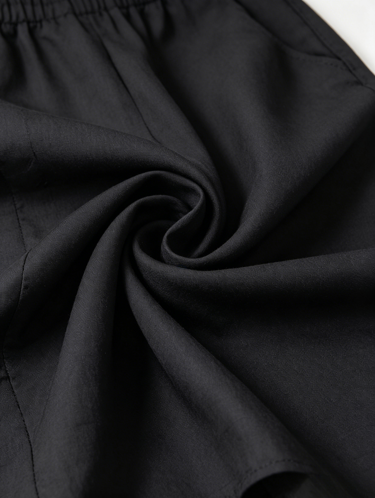 MARBELLA| MONO NEGRO CON HOMBROS AL AIRE Y CORDÓN AJUSTABLE