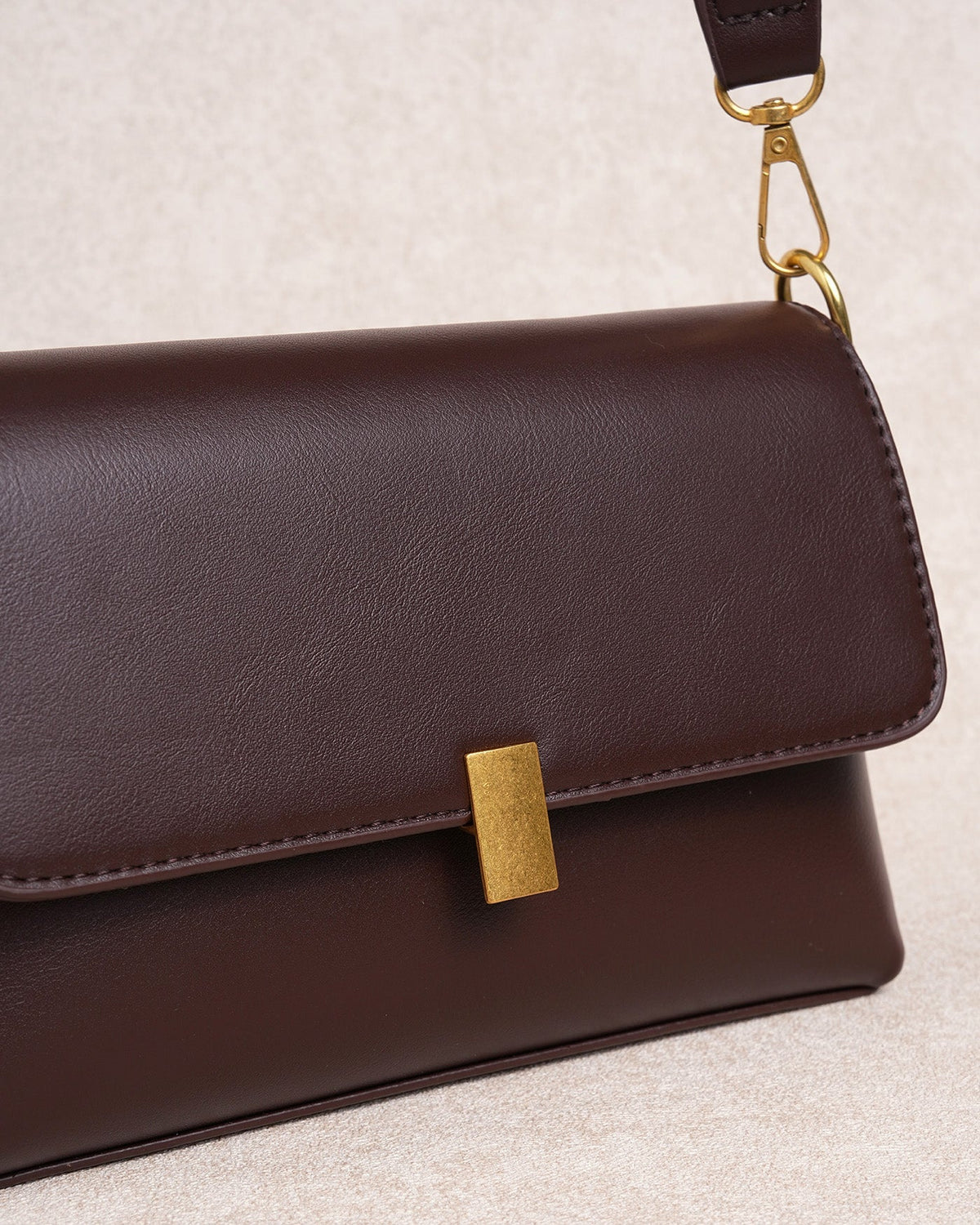 AURA | BOLSO DE MANO CUERO